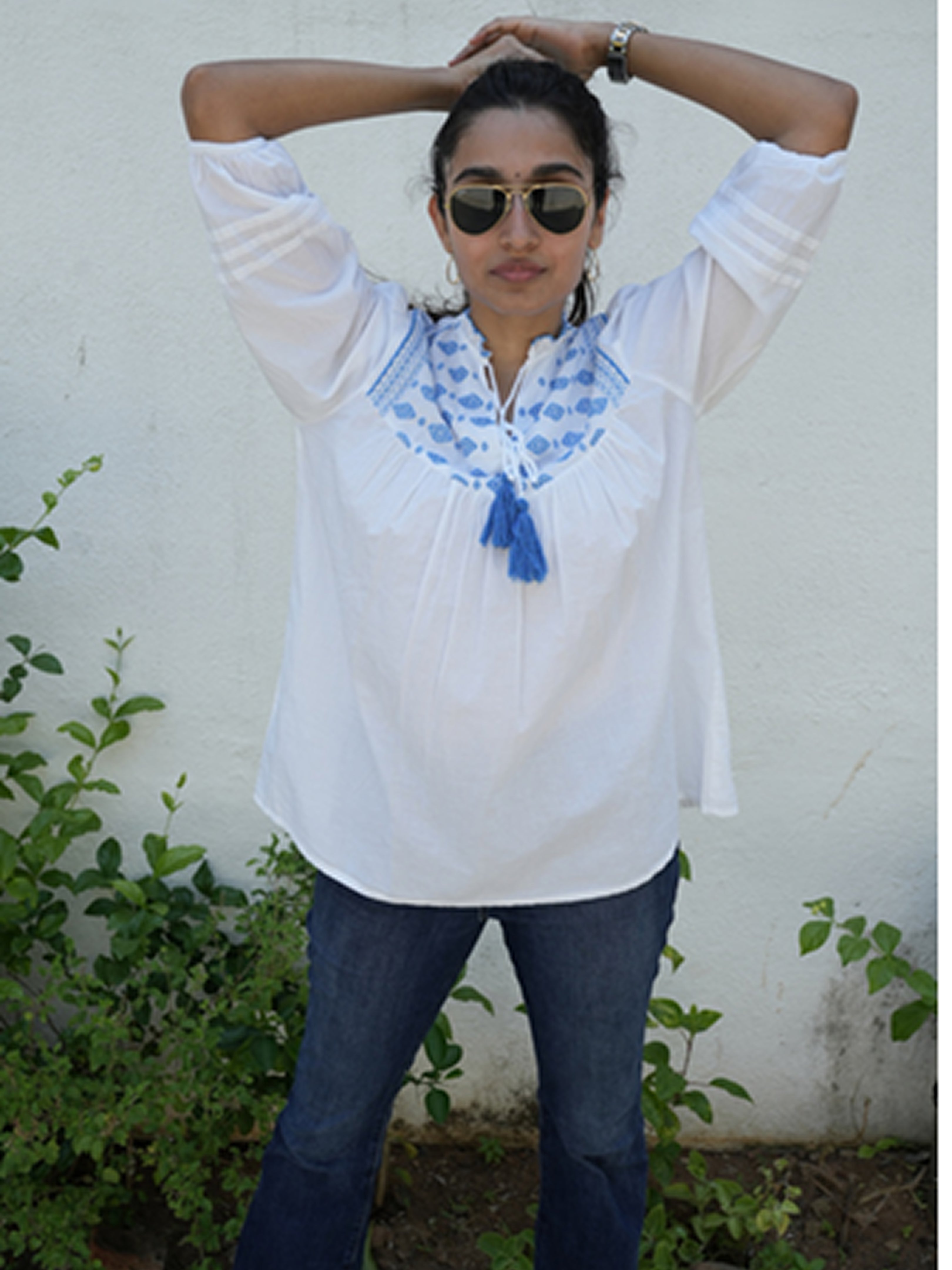 Bow Short Kurti With Yoke Embroidery In Lite Blue