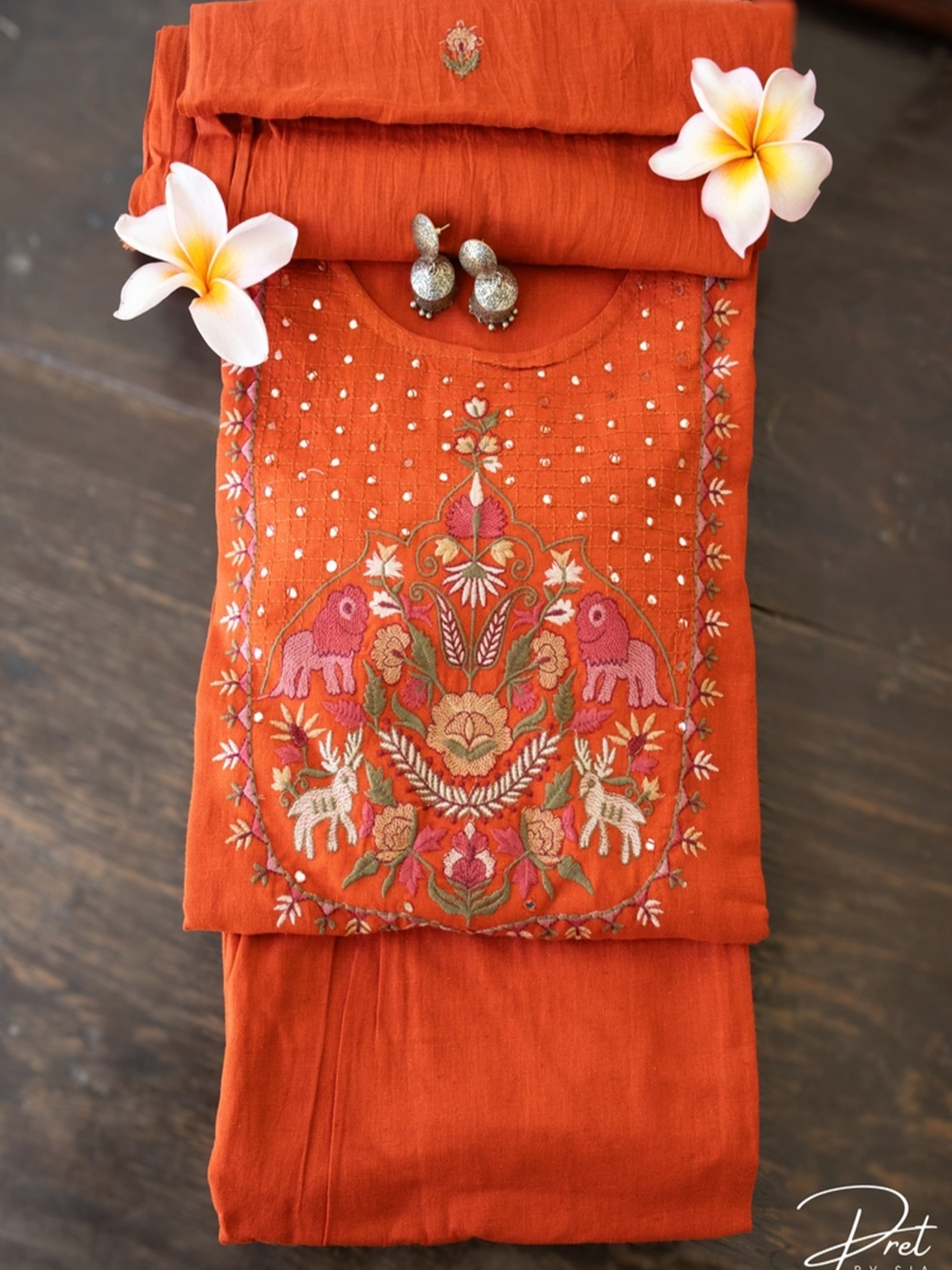 Rust Kurta Set Embroidery and Neckline