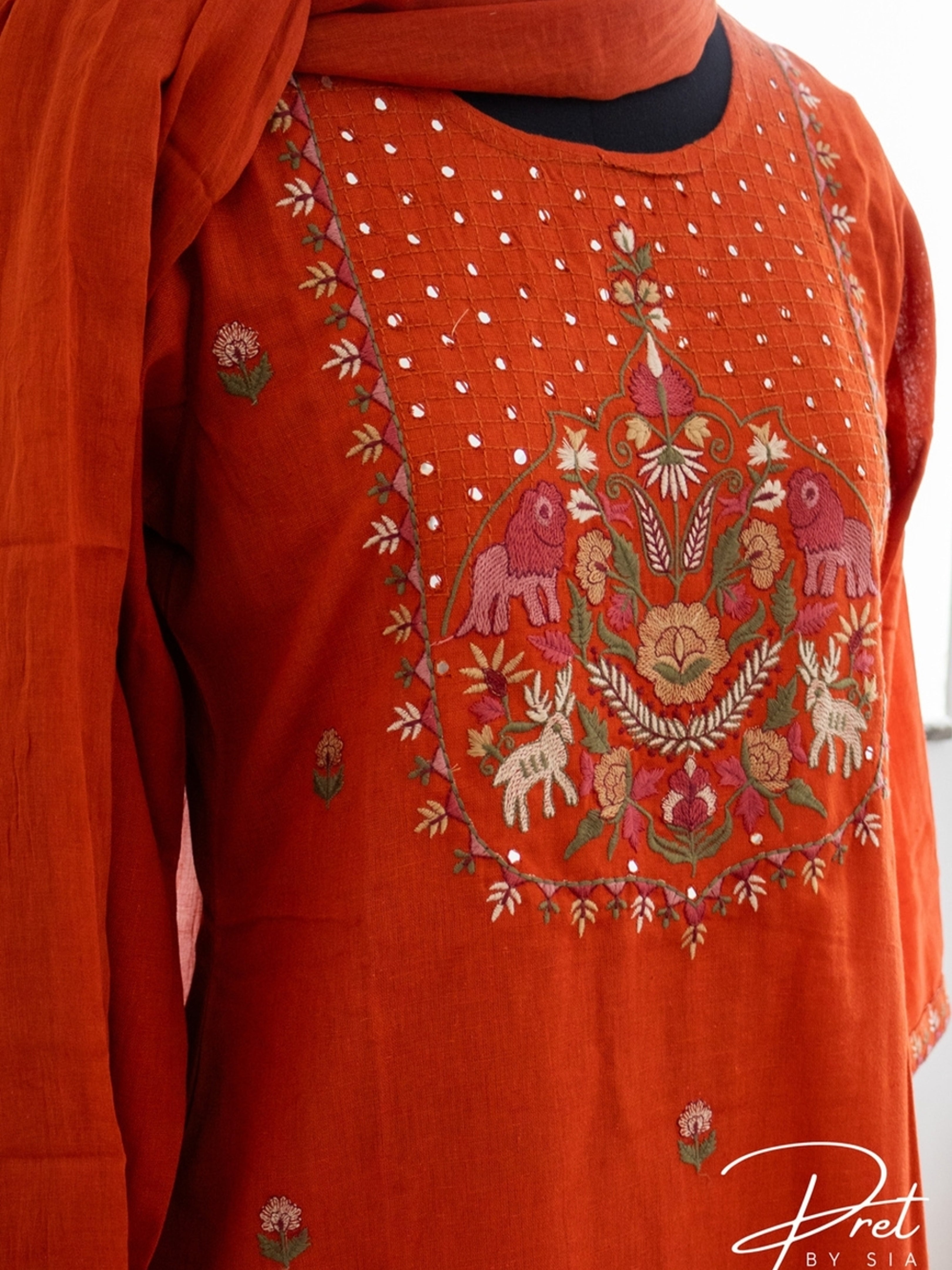 Rust Kurta Set Embroidery and Neckline