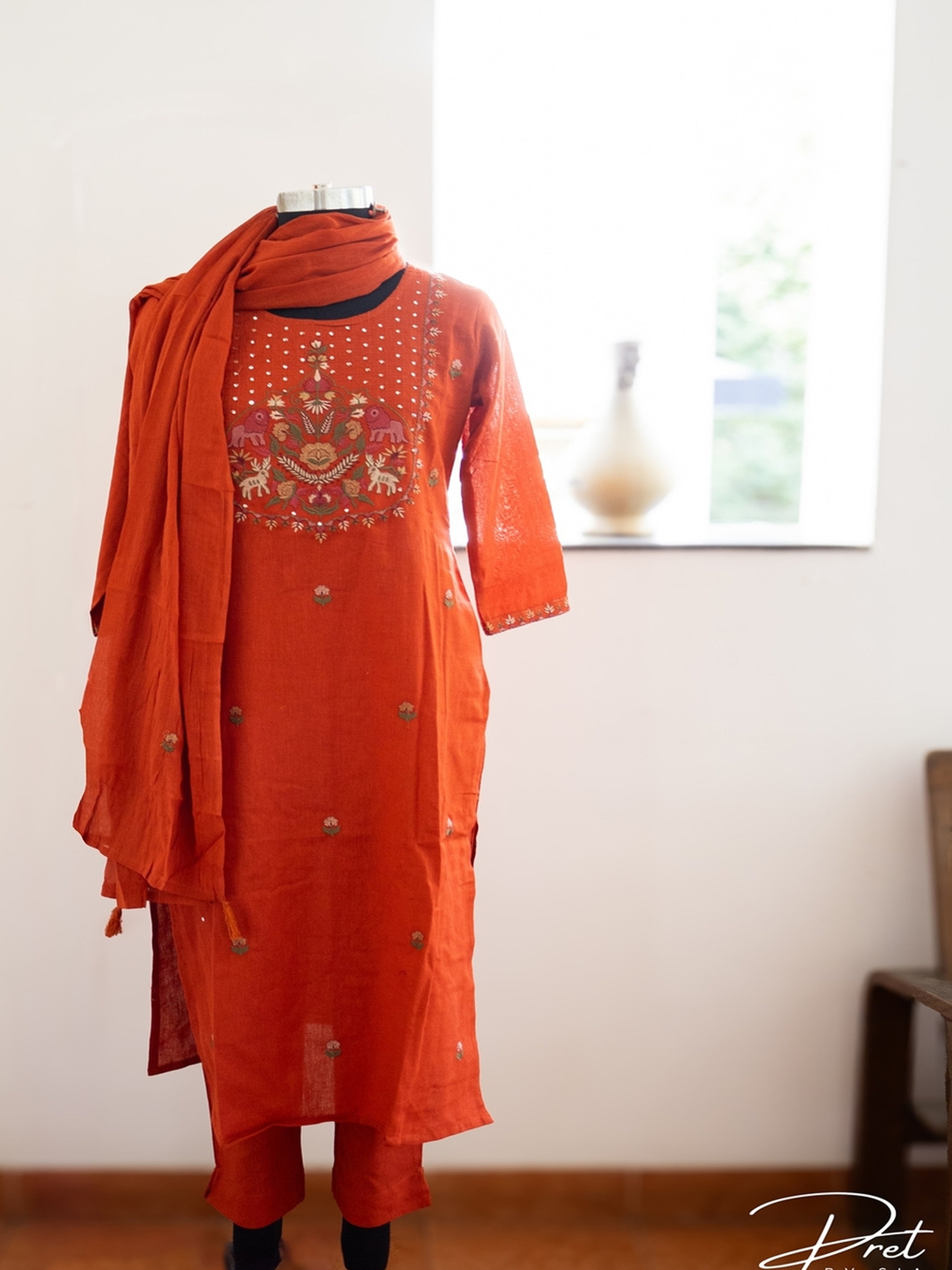 Rust Kurta Set Embroidery and Neckline